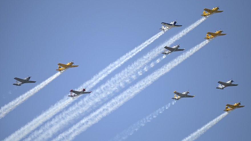 Beechcraft T-34 Mentor aircraft fly in formation during the Sun 'n Fun Aerospace Expo in Lakeland, Florida, on April 14. Photo by Phelan M. Ebenhack.