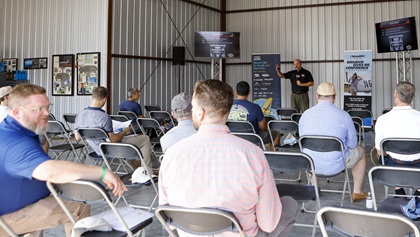 Seminars drew attendees—who stayed socially distanced—including this history/future talk by Hartzell Propeller.