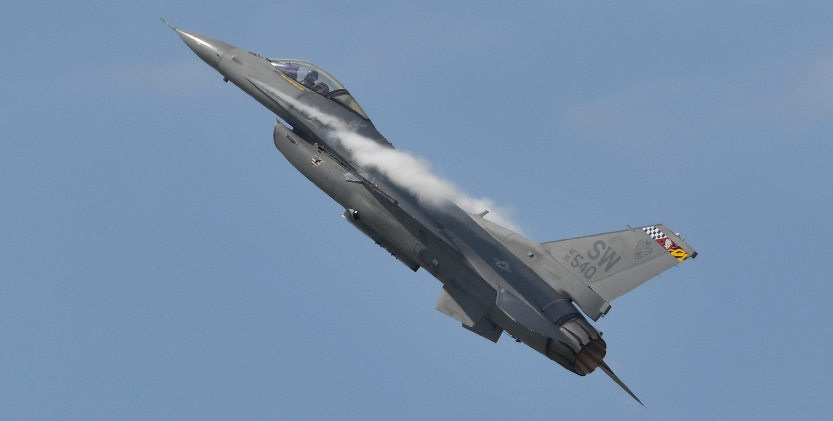 The thrust and vertical speed of this U.S. Air Force F-16 Viper demonstration flight at the 2019 Sun 'n Fun International Fly-In and Expo causes moisture to condense just above the wing roots. Photo by Mike Collins.