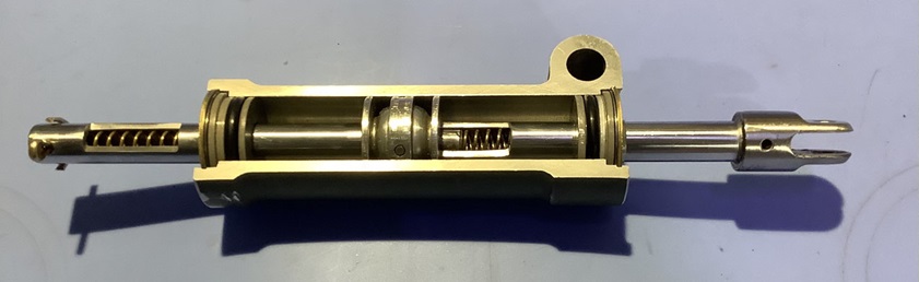 Cutaway of a Beechcraft shimmy damper with reserve mechanism inside the shaft (piston O-rings removed for clarity). Photo courtesy of Doug Haughton.