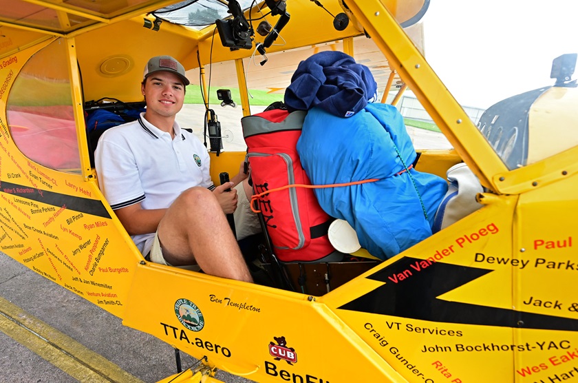 Ben Templeton, 18, is flying a Piper J-3 Cub to 48 states to help make youth aware of aviation careers and opportunities. Photo by David Tulis.