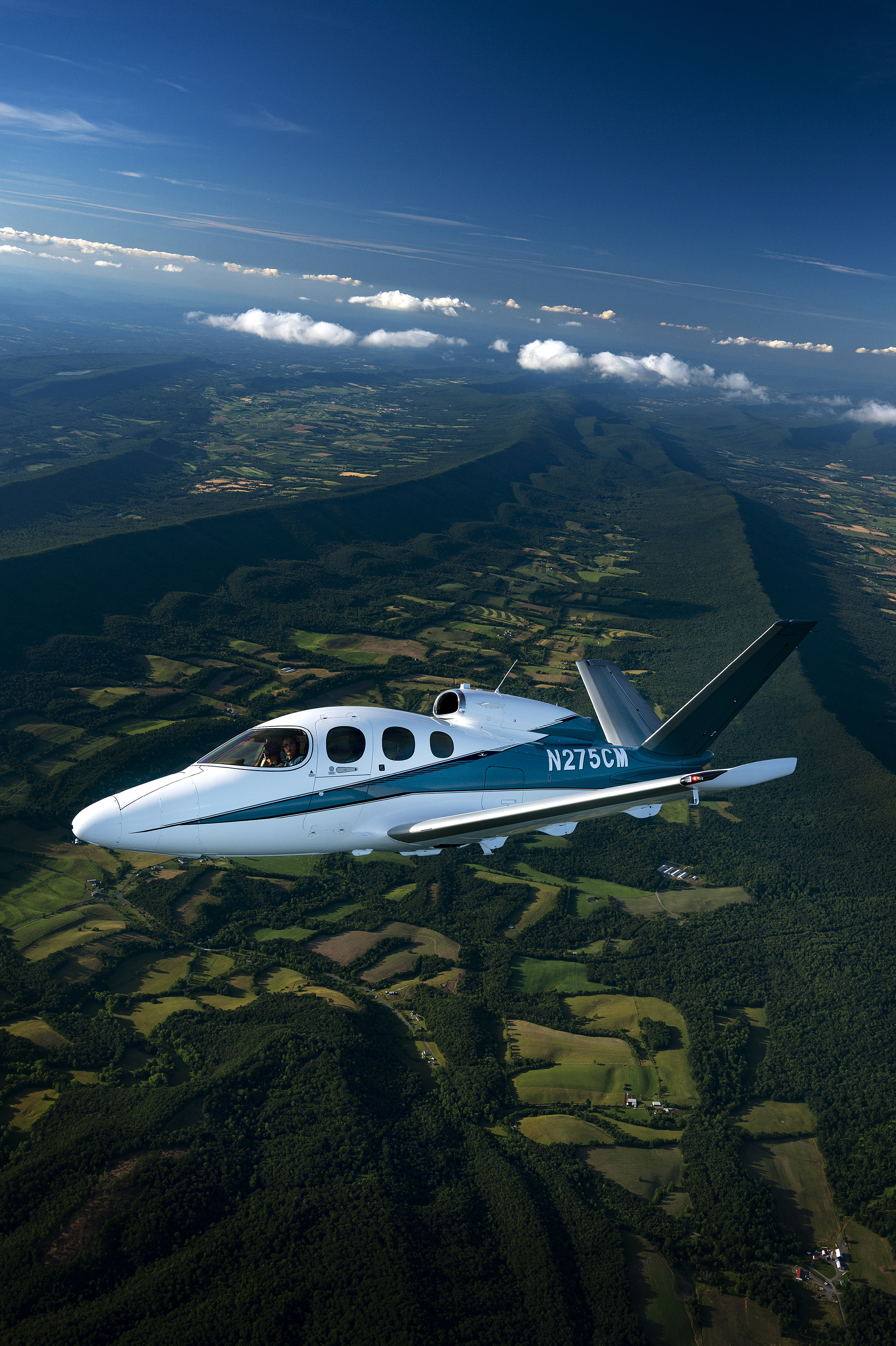 The Appalachian Mountains of West Virginia frame a Cirrus Vision Jet G2+ that is capable of cruising at 305 knots true airspeed. Photo by David Tulis.