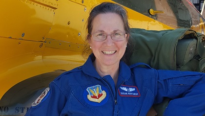 FAA Federal Air Surgeon Dr. Susan Northrup is a retired U.S. Air Force colonel. She also grew up in an aviation family, is a private pilot, and understands general aviation. Here, she is shown next to the family's Canadian Car and Foundry Harvard Mark IV, a version of the North American T-6 warbird trainer. Photo courtesy of John Hyle.