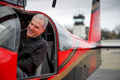 The surprise of winning the AOPA Sweepstakes Van’s Aircraft RV-10 sets in as Aaron Benedetti sits in the left seat at California’s Livermore Municipal Airport on January 24, just minutes after the big reveal. Photo by Chris Rose.