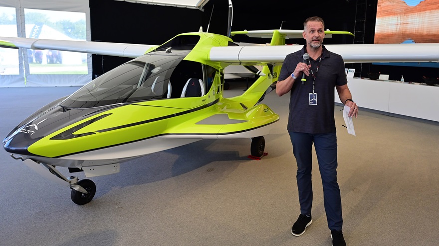 Icon Aircraft Vice President of Sales, Marketing, Flight Operations, and Service Warren Curry announces that a version of the Icon A5 amphibious aircraft is expected to be certified by the FAA in the fall of 2021 and will carry a suggested retail price of $399,000. Photo by David Tulis.