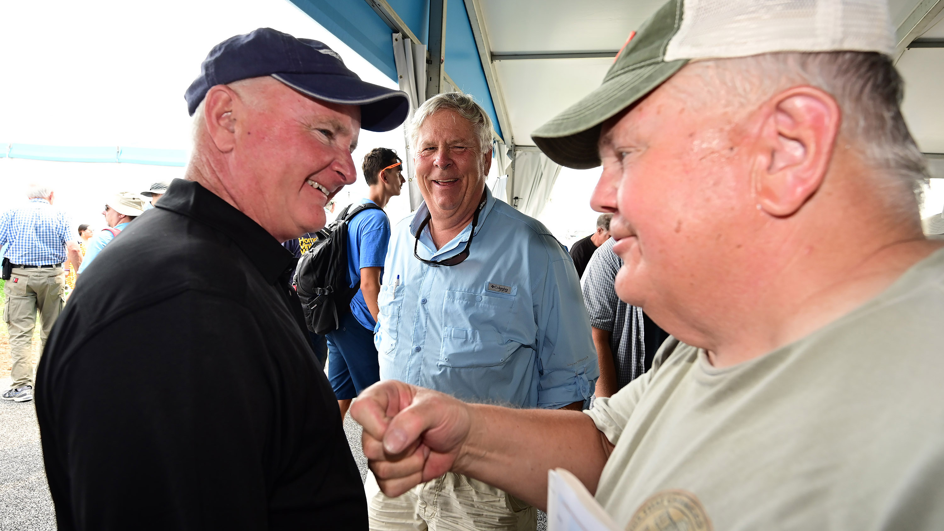 AOPA President Mark Baker greets attendees at the AOPA Pilot Town Hall during EAA AirVenture July 28. Baker said the flight activity he's observed recently is the most he’s seen in years. Photo by David Tulis.