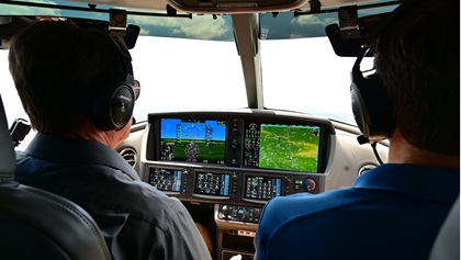Tom Haines, AOPA senior vice president of media, communications, and outreach, pilots a Cirrus SF50 Vision Jet. Photo by David Tulis.