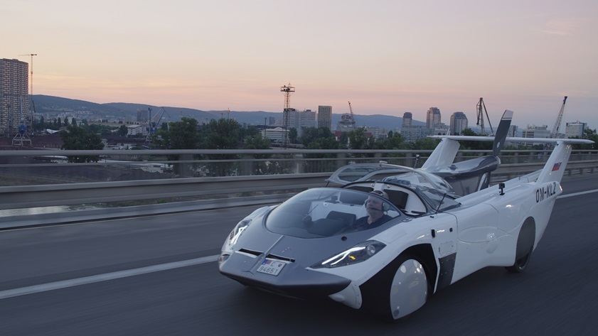 Wings and tail tucked, the AirCar takes the road as a convertible in more senses than one: In this photo, the canopy is retracted. Photo courtesy of Klein Vision.