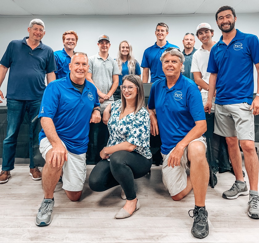 Flyt Aviation staff members pose for a group portrait. Photo courtesy of Flyt Aviation.
