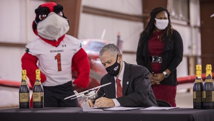 Southeast Missouri State University personnel sign documents establishing a four-year professional pilot program. Photo courtesy of Joshua Russell, Southeast Missouri State University.