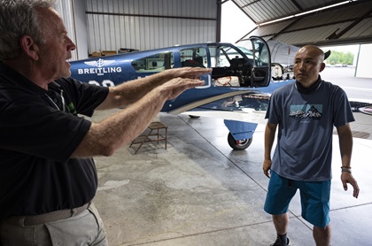 Adrian Eichhorn helped coach Shinji Maeda for a solo around-the-world flight and will accompany him part of the way in a separate and nearly identical Beechcraft Bonanza V35 as they depart Manassas, Virginia, and fly north. Photo by David Tulis.