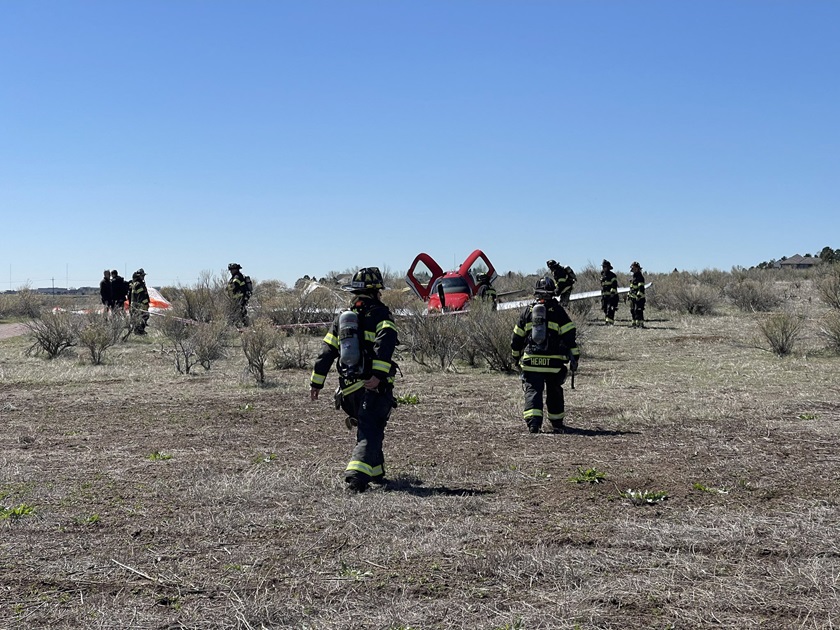A Cirrus SR22 with two people aboard touched down under its airframe parachute after colliding with a Fairchild Swearingen Metroliner hauling cargo as both aircraft approached parallel runways at Centennial Airport in Denver on May 12. The badly damaged Metroliner landed without incident or injuries. Photo courtesy of South Metro Fire Rescue. 