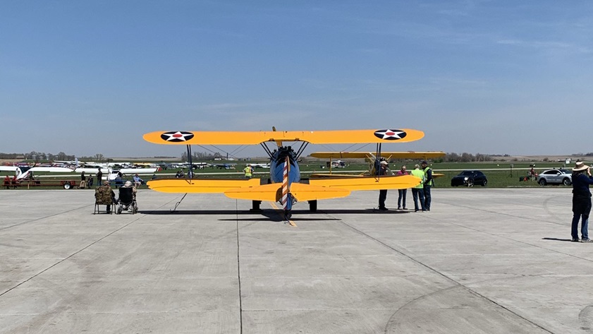 This Stearman PT-17 makes a perfect place to watch airplanes and people during the Mayday STOL Drag. Photo by Alicia Herron.