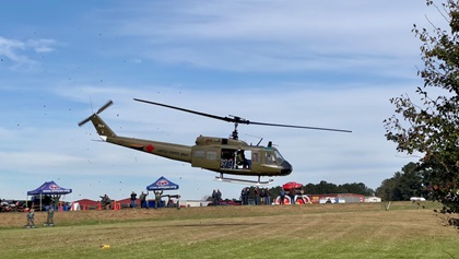 Retired military helicopters gave rides to members of the aviation community and general public as part of the Veterans Day event . Photo by Brian Uretsky.