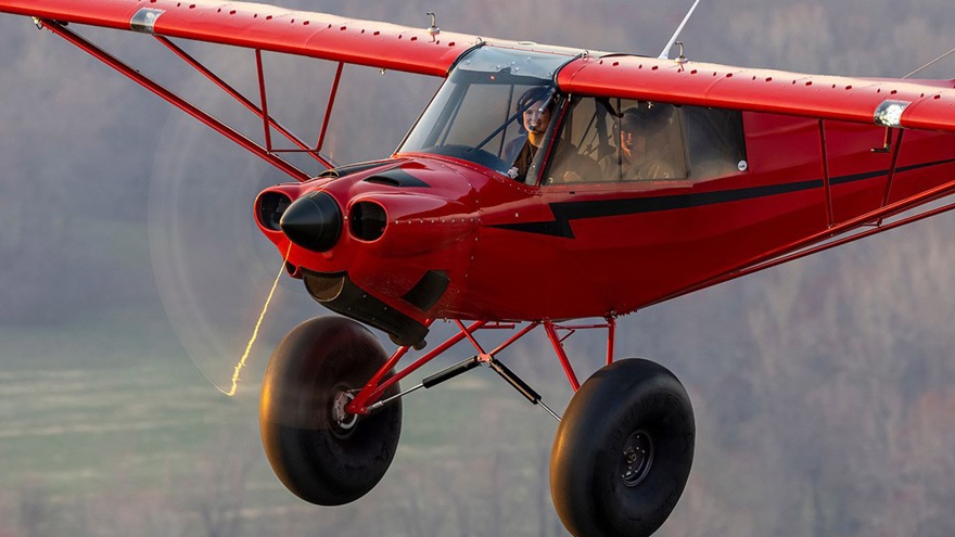 The author flying her favorite airplane, a CubCrafters Carbon Cub EX-2, affectionally named “Big Brother Red.” Photo by Jim Raeder. 