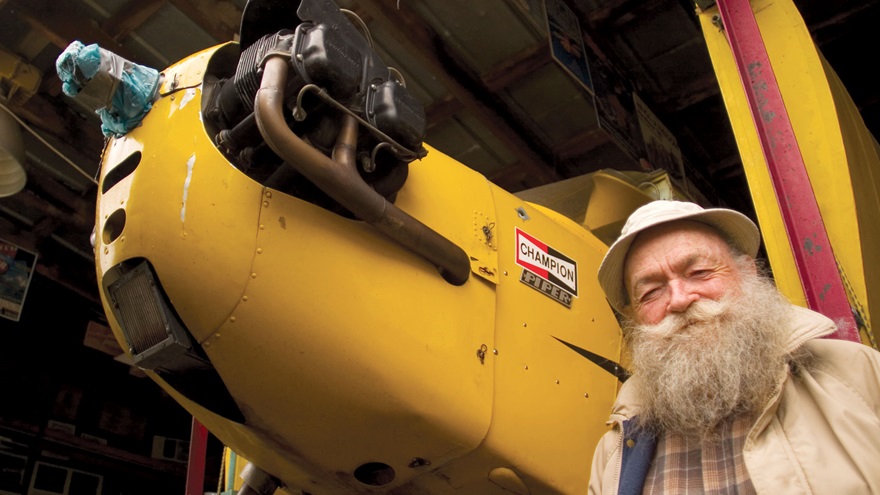 "The Flying Farmer" airshow performer Charles "Charlie" Kulp, of Virginia, who pretended to learn how to fly a Piper J-3 Cub in a flying-comedy routine that spanned decades and delighted thousands, died at age 96. Photo by Tim Wright.