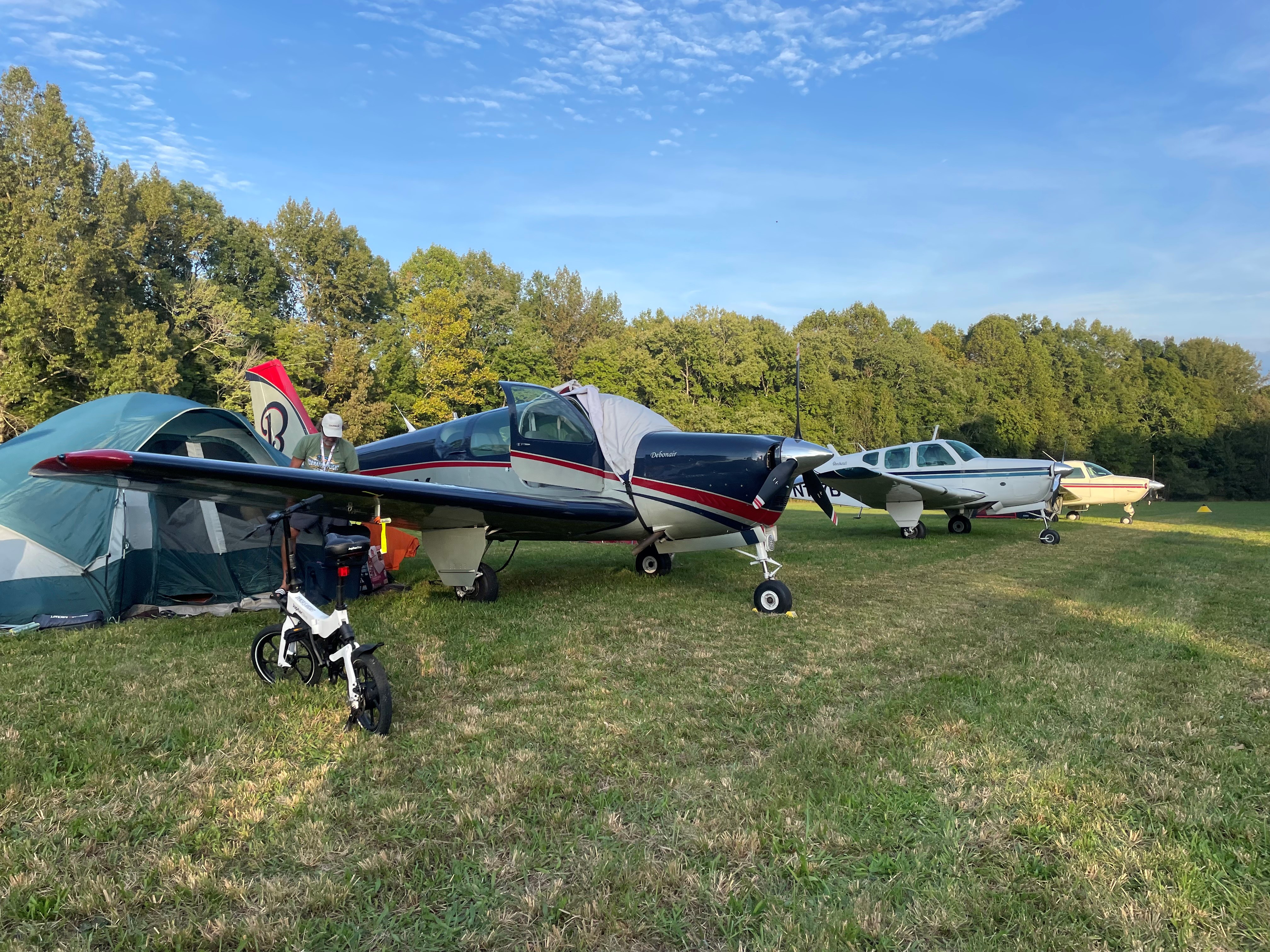 Pilots camp next to their airplanes during the Beech Party. Photo by Madison Murray. 