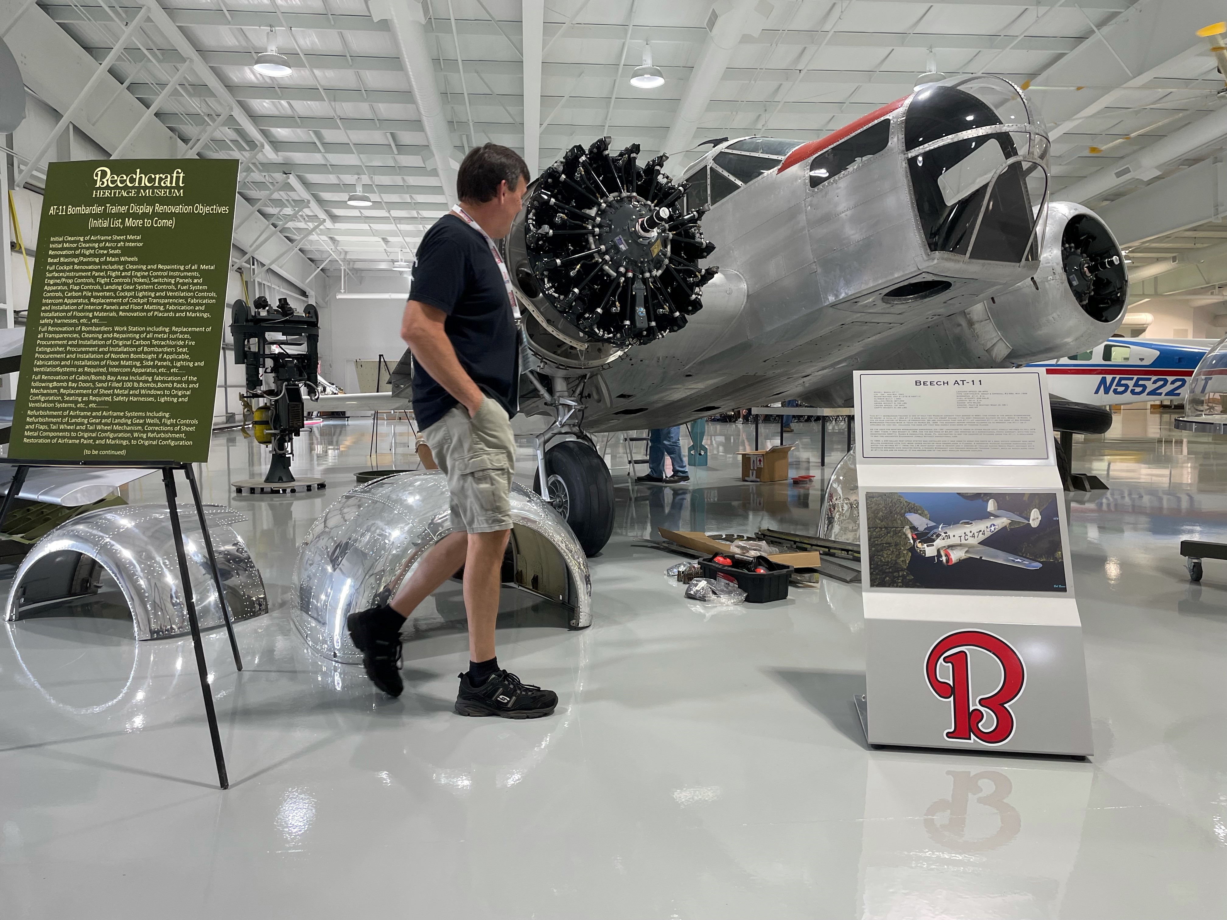 AT-11 owner John Hess inspects the Beechcraft Heritage Museum’s AT-11 project. Photo by Madison Murray.