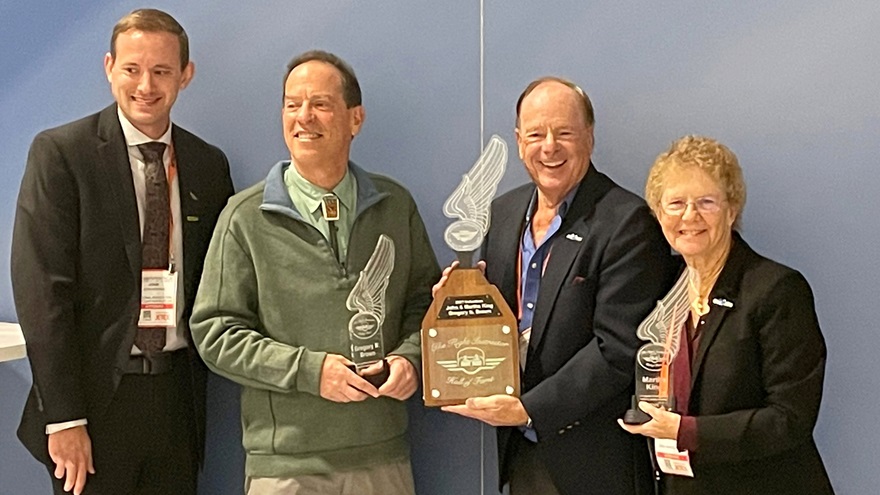 John and Martha King are inducted into the Flight Instructor Hall of Fame October 13 during a presentation with fellow inductee Greg Brown and National Association of Flight Instructors Program Director John Niehaus (left). Photo by Kollin Stagnito.