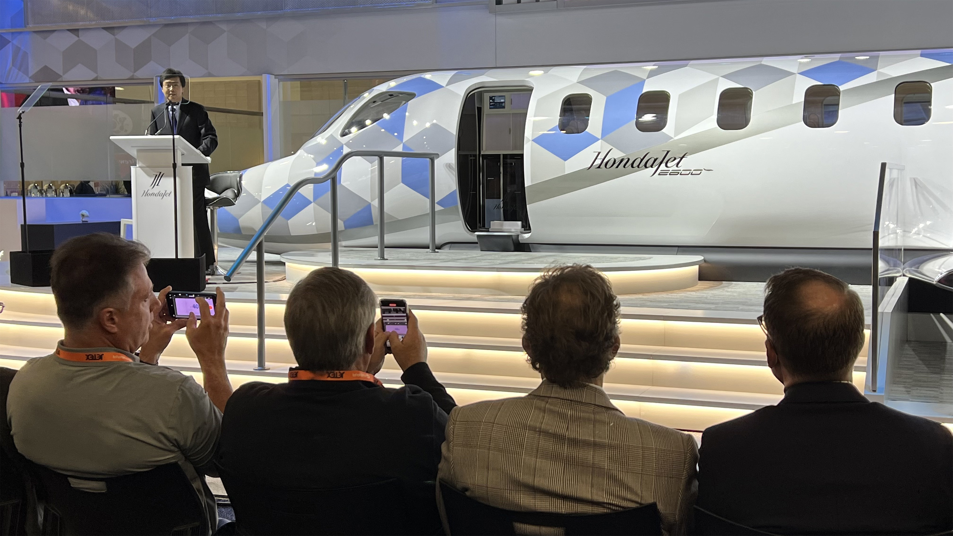 Honda Aircraft President and CEO Michimasa Fujino unveils the company's next big thing, the HondaJet 2600. Photo by Paul Harrop.