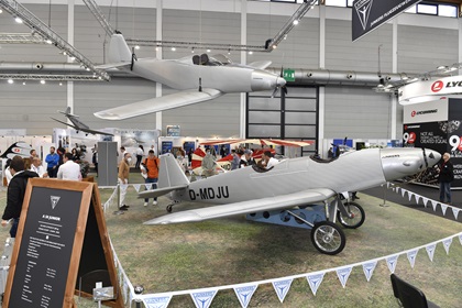 Junkers' Aero exhibit prominently featured the ultralight A50 Junior, based on the original 1929 design, and another retro-reboot with modern features and a style that evokes aviation's roots. Photo by Mark Wagner.