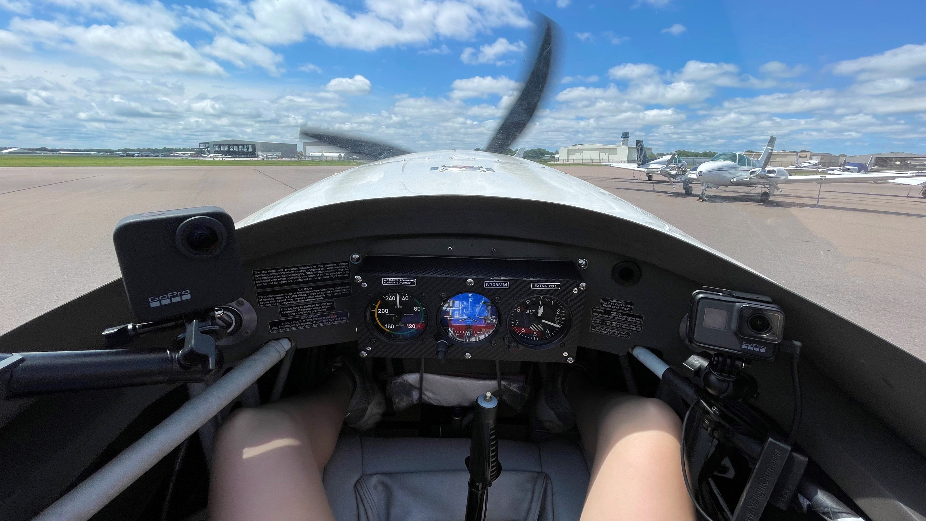 Cayla McLeod strapped into the Extra 300L for a 30-minute flight with Richard McSpadden. Photo by Cayla McLeod.