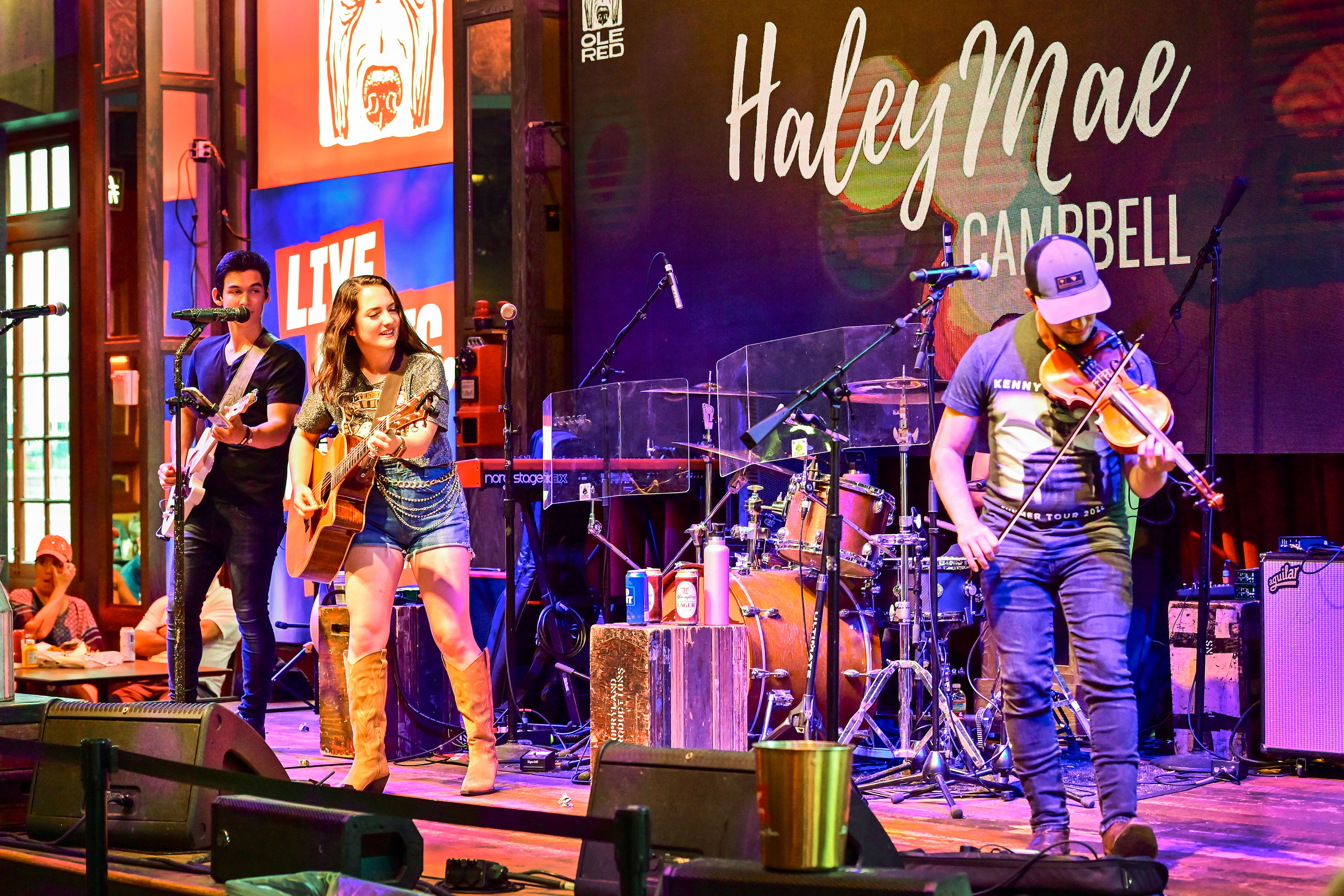 Haley Mae Campbell performs onstage at a downtown honky-tonk. Photo by David Tulis.