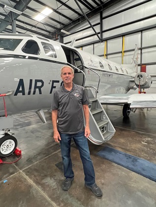 Patriots Jet Team founder Randy Howell stands in front of one of the team's North American Sabreliner 60s used in their Upset Prevention and Recovery Training program. Photo by Niki Britton.