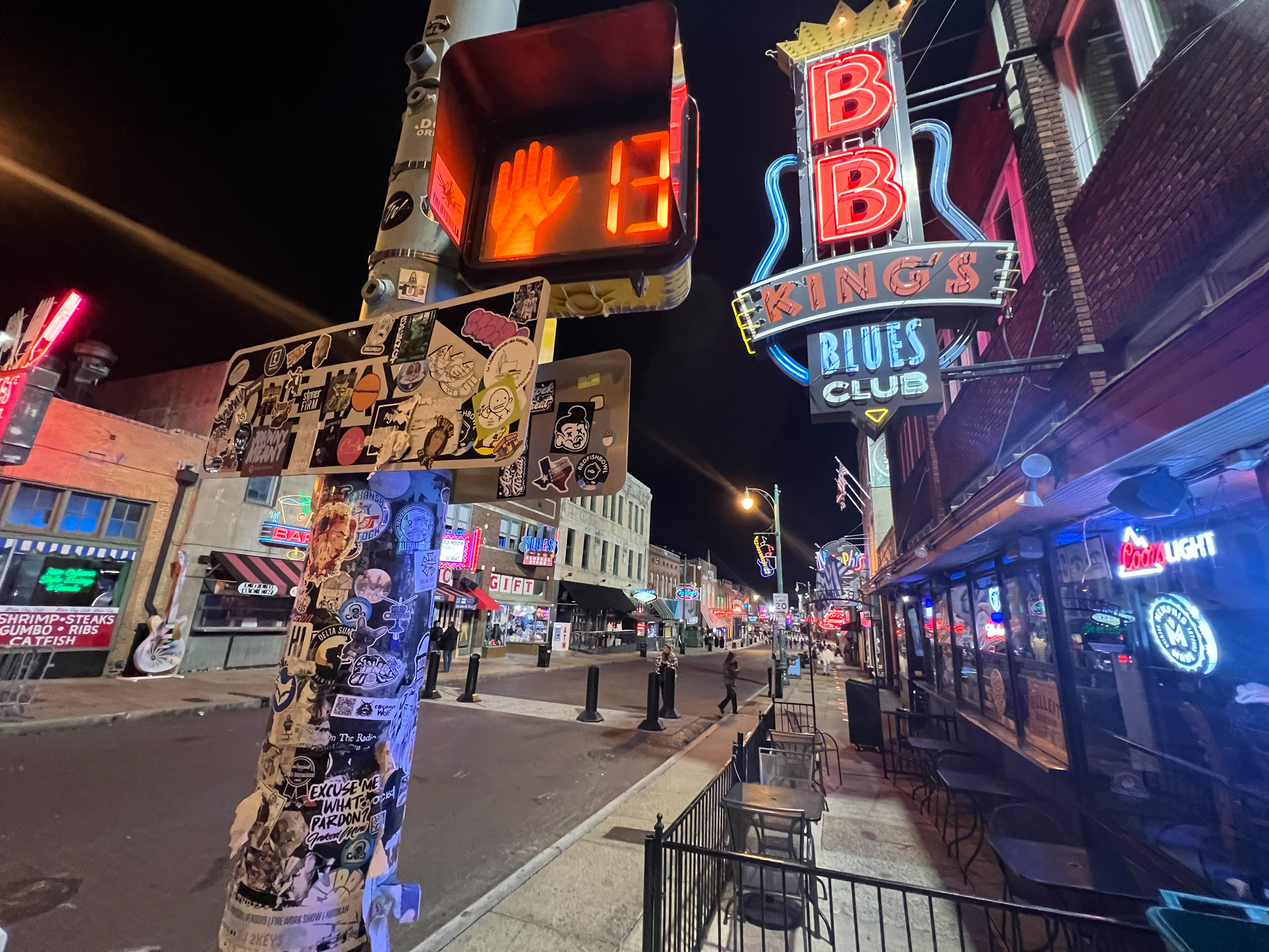Stickers cover the light poles along Beale Street. Photo by Sierra Harrop.