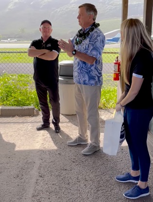 AOPA President Mark Baker recognized State Sen. Gil Riviere for his critical role in saving Kawaihapai Airfield from closure during AOPA's appreciation brunch at the airfield. Photo by Melissa McCaffrey.