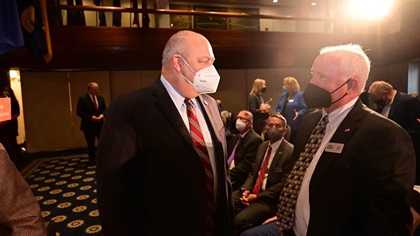 FAA Administrator Steve Dickson talks to AOPA President Mark Baker moments before Dickson announced a public-private partnership to eliminate lead from aviation fuel by 2030 during the General Aviation Manufacturers Association State of the Industry event in Washington, D.C., February 23. Photo by David Tulis.