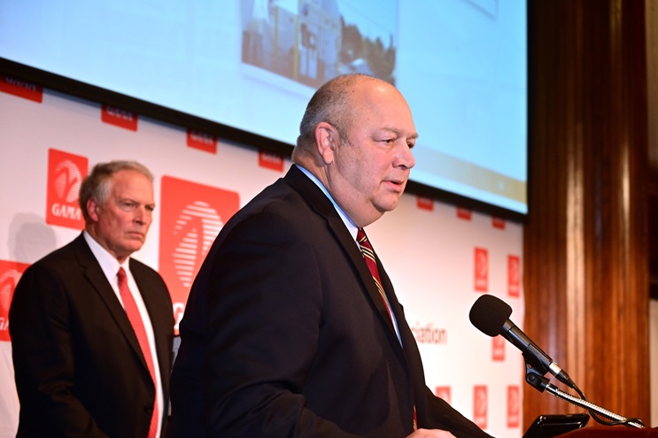 FAA Administrator Steve Dickson details the plan to remove lead from aviation fuel by 2030, with General Aviation Manufacturers Association President and CEO Pete Bunce looking on, during GAMA's February 23 State of the Industry event in Washington, D.C. Photo by David Tulis.