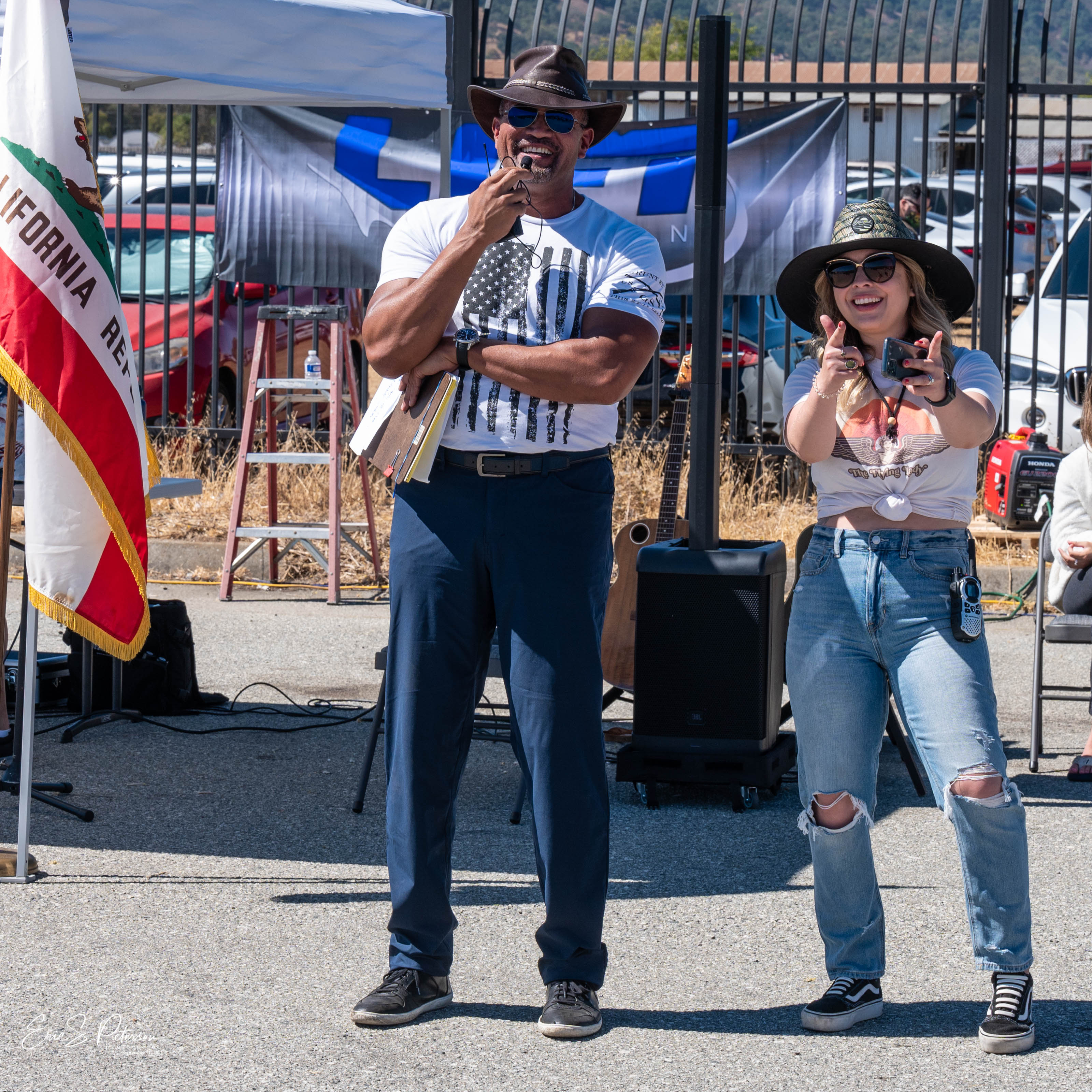 The Food Truck Fly-In's co-chairs, Dr. Joe McMurray (left) and Niki Britton (right), welcome attendees to the event. Photo by Eric Peterson.
