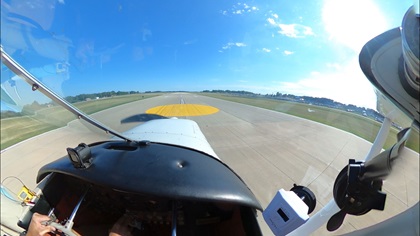 The AOPA Sweepstakes Cessna 170 just before touchdown after the yellow dot on Runway 18R at Wittman Regional Airport in Oshkosh, Wisconsin. Photo by Erick Webb.