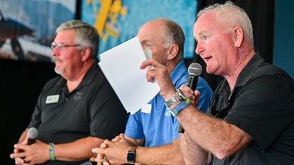 AOPA President Mark Baker briefs members during the Pilot Town Hall at EAA AirVenture Oshkosh in Wisconsin, July 28, 2022. Photo by David Tulis.