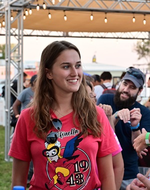 Attendees gather at the AOPA 39 Lounge during the night airshow at EAA AirVenture in Oshkosh, Wisconsin, July 272. Photo by David Tulis.