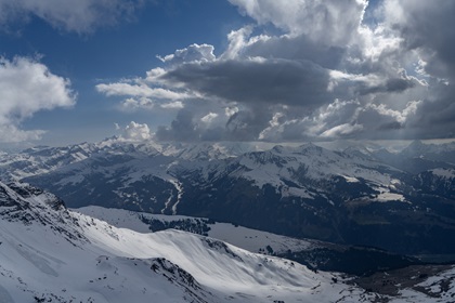Climbing through 8,000 feet east of Zweisimmen, Switzerland, with afternoon buildup. Photo by Garrett Fisher.