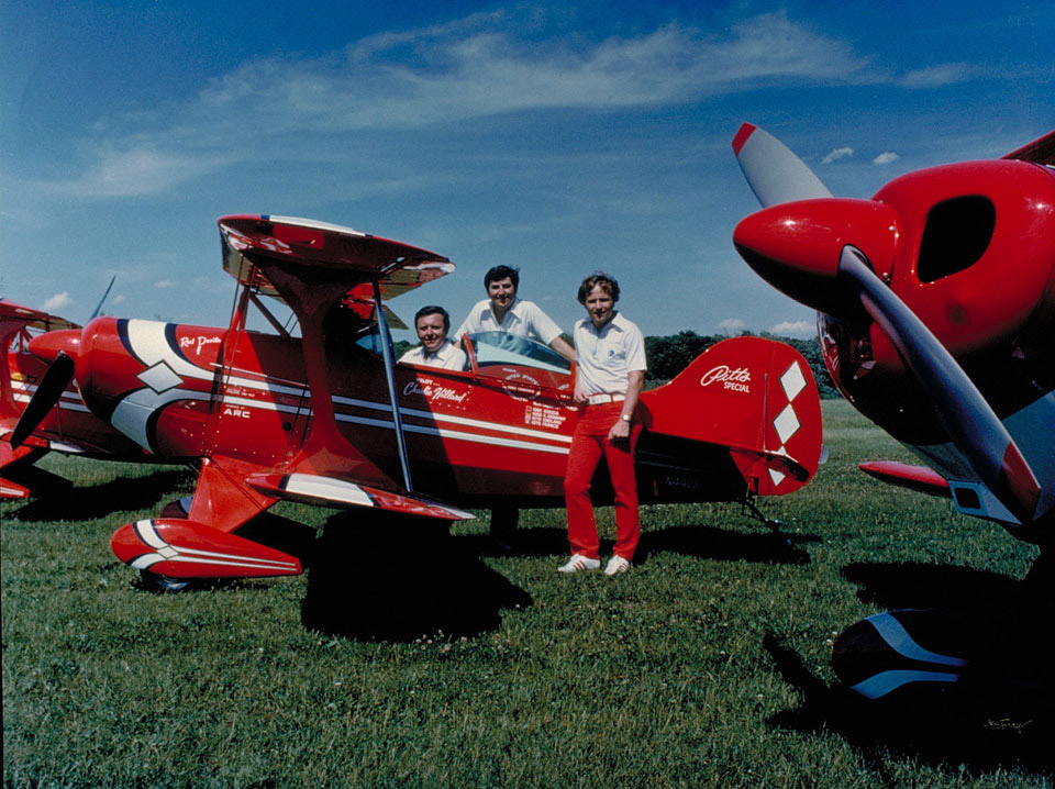 (from left) Charlie Hillard, Gene Soucy, and Tom Poberezny with the Pitts Special aircraft they flew as the Red Devils Aerobatic Team in the 1970s. Photo courtesy of EAA.