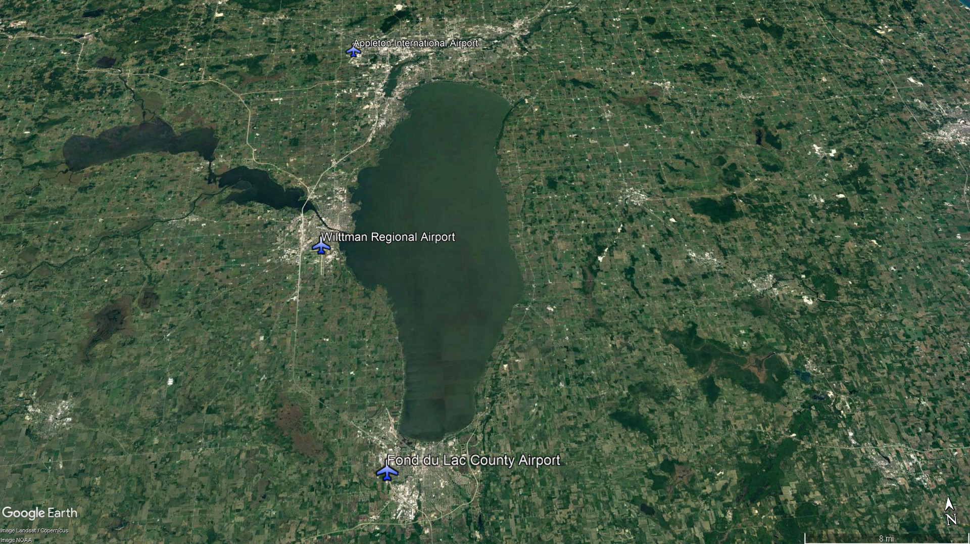 While Wittman Regional Airport becomes the busiest airport in the world during EAA AirVenture, options to the north and south of Oshkosh, Wisconsin, offer smaller crowds, camping, and ground transportation options to get to and from the big show. Google Earth image.