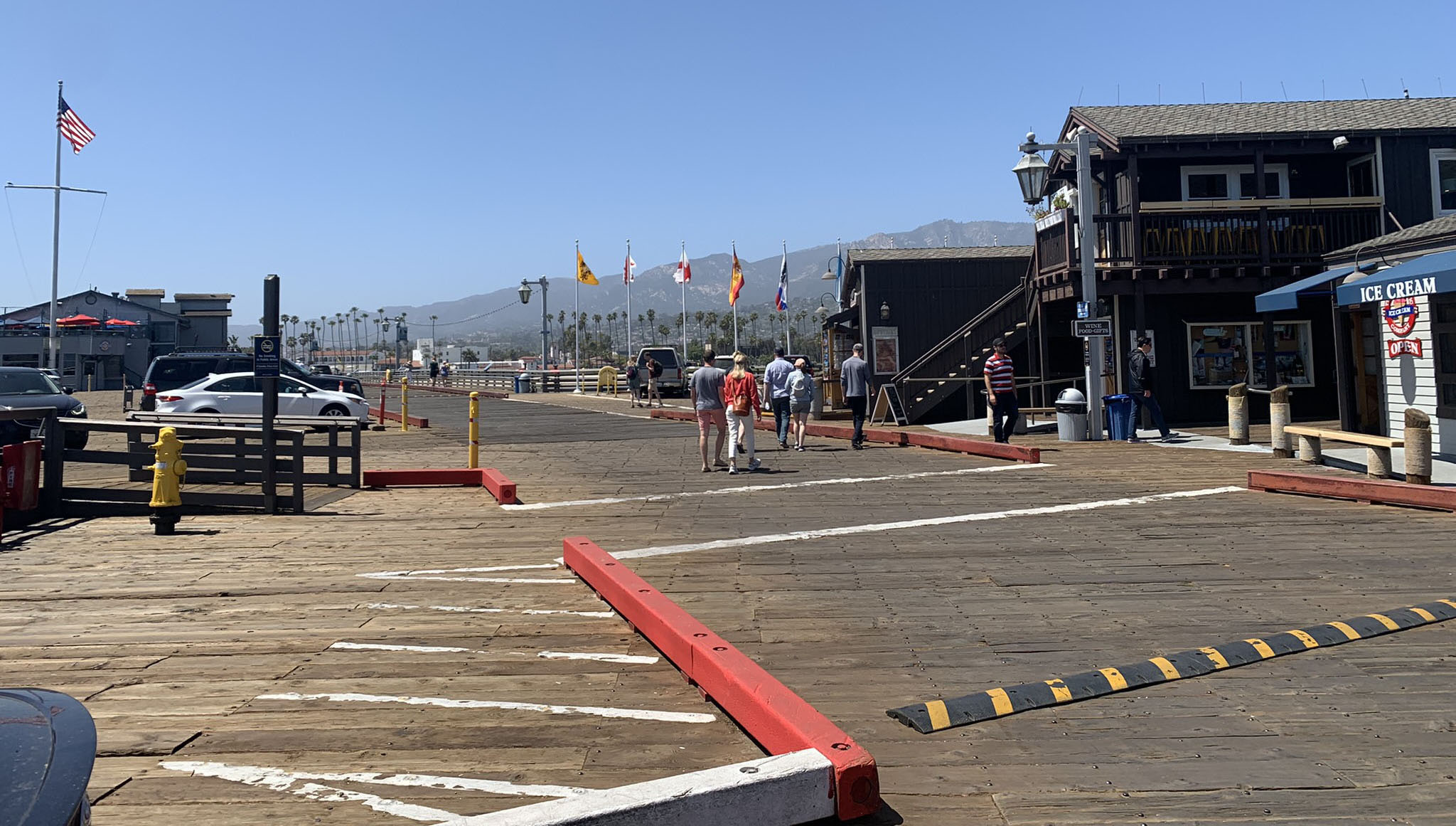 Looking down the wharf toward the palm tree-lined streets of Santa Barbara. Photo by Alicia Herron.