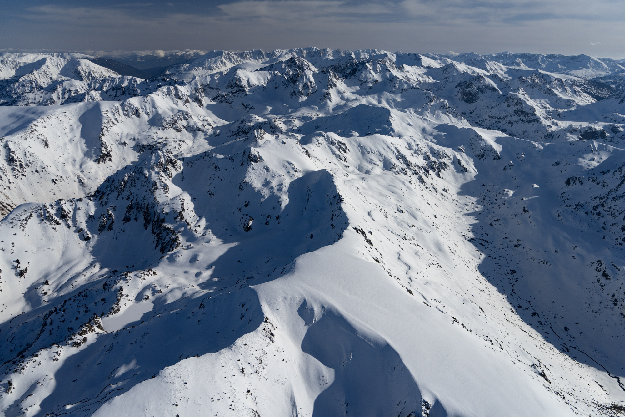 A view of the border of France and Andorra, a small principality known for ski resorts and as a tax haven. Photo by Garrett Fisher. 