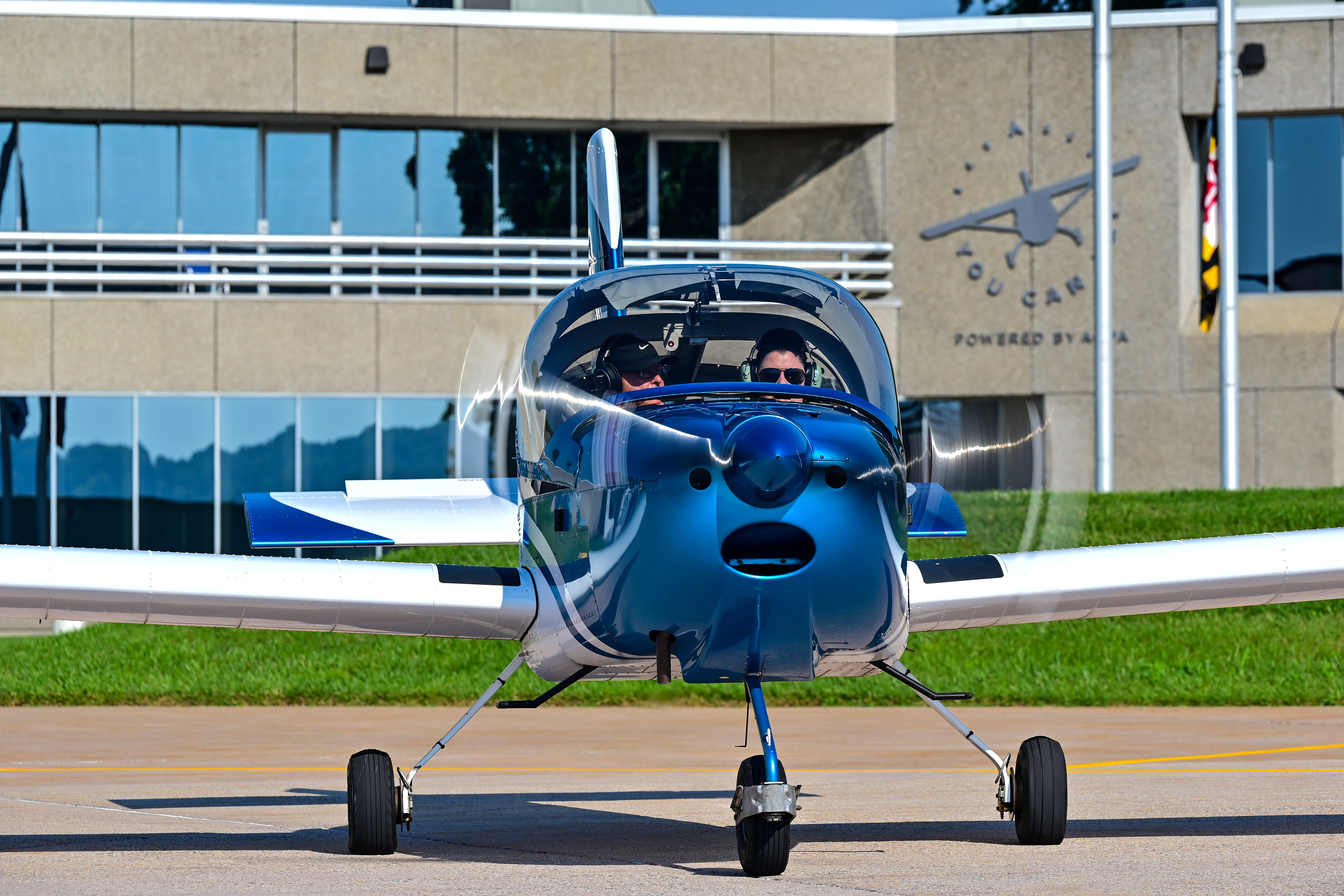 High school teacher Jennifer Angerami of Saddlebrook, New Jersey, taxis in a Van's Aircraft RV–12 with AOPA Flying Clubs Director Steve Bateman. Photo by David Tulis. 