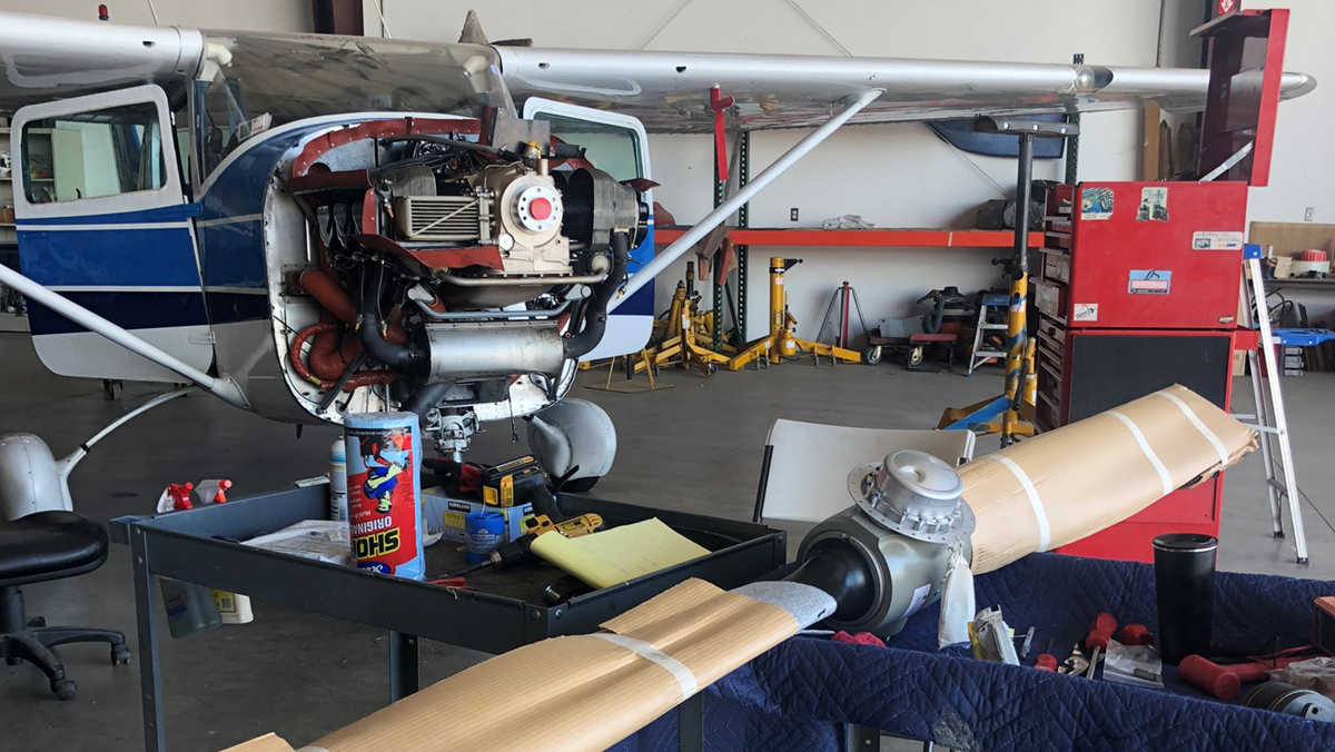 A Cessna 182 awaits installation of an overhauled propeller at San Martin Aviation in San Martin, California. Photo by Niki Britton.