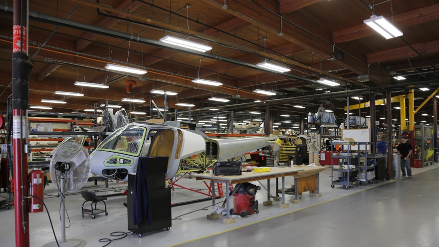 Chuck Surack told AOPA he is working to hire as many Enstrom staff back as possible to work at the Michigan factory (seen here during a 2014 visit) that abruptly shut down in January. Photo by Chris Rose. 