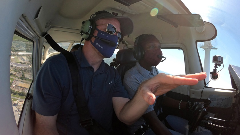 Victoria Wentt from Col. Zadok Magruder High School in Maryland handles flying duties during a general aviation discovery flight with Chris Moser, AOPA senior director of flight training education, at Frederick Municipal Airport on August 18, 2020. Photo by David Tulis and Josh Cochran.