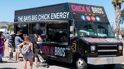 Guests of San Martin Airport's first-ever Food Truck Fly-in await their food from the Chick N’ Bros food truck. Photo by Eric Peterson.
