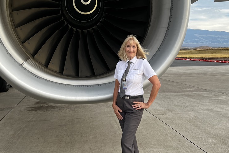 Capt. Kiki Culler stands in front of the engine of a Hawaiian Airlines Airbus A330. Photo courtesy of Kiki Culler.