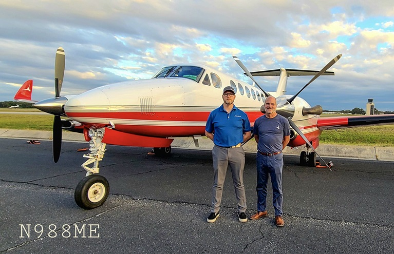 A Tamarack Aerospace-upgraded Beechcraft King Air 350 with pilot Tim Smith (left) and Tamarack founder and pilot Nick Giuda. Photo courtesy of Tamarack.