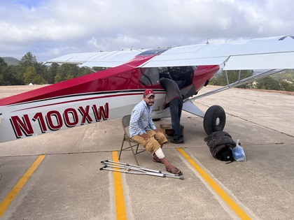 A man with a broken leg prepares for transport to the hospital. Photo courtesy of Brent Dodd.