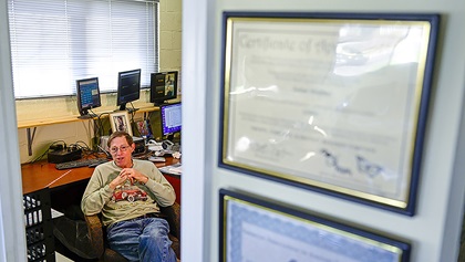 Washington Executive/Hyde Field Airport Manager Stan Fetter explains how the closure of the airport will affect pilots. Photo by David Tulis.